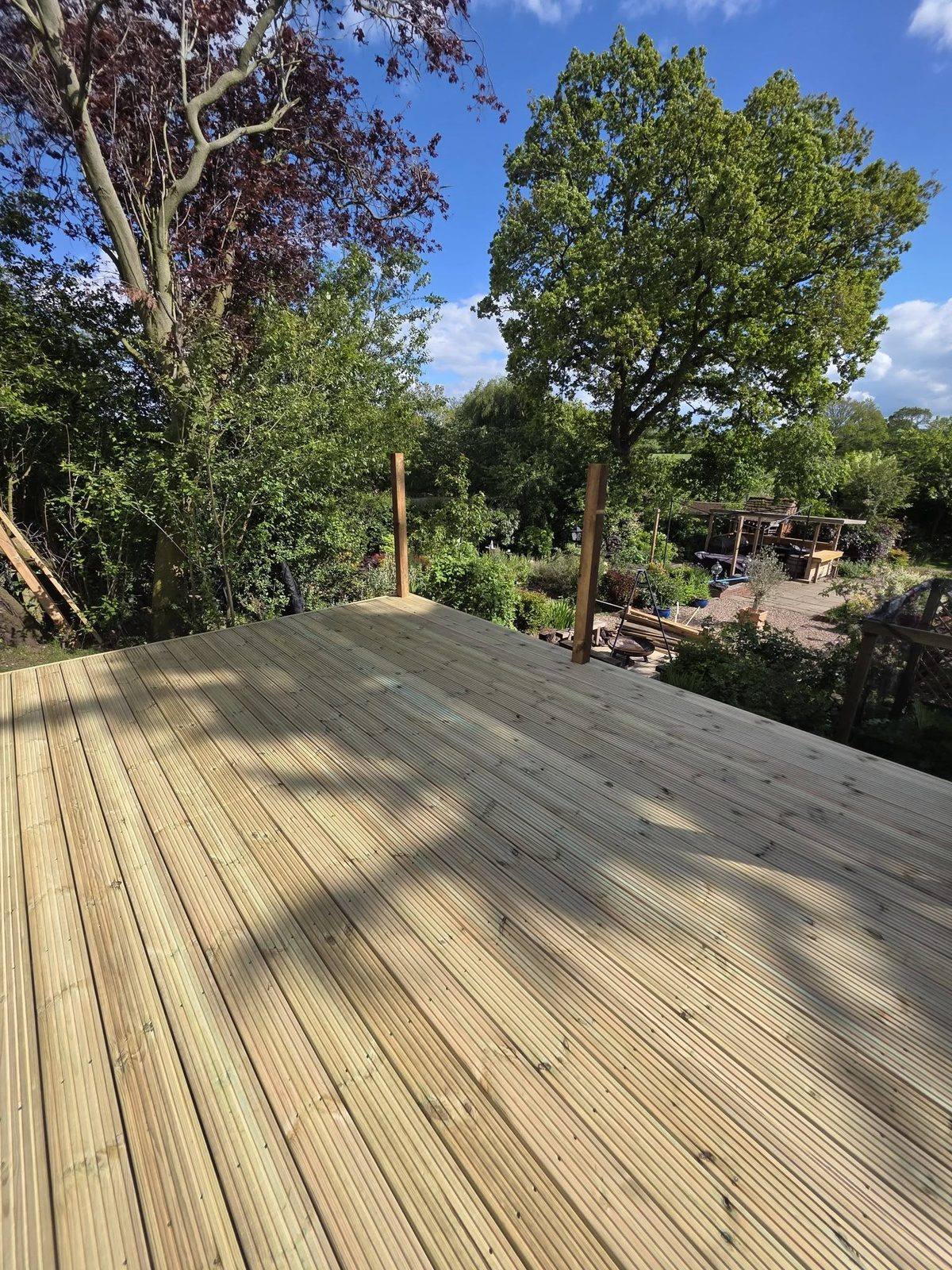 New timber garden decking overlooking trees