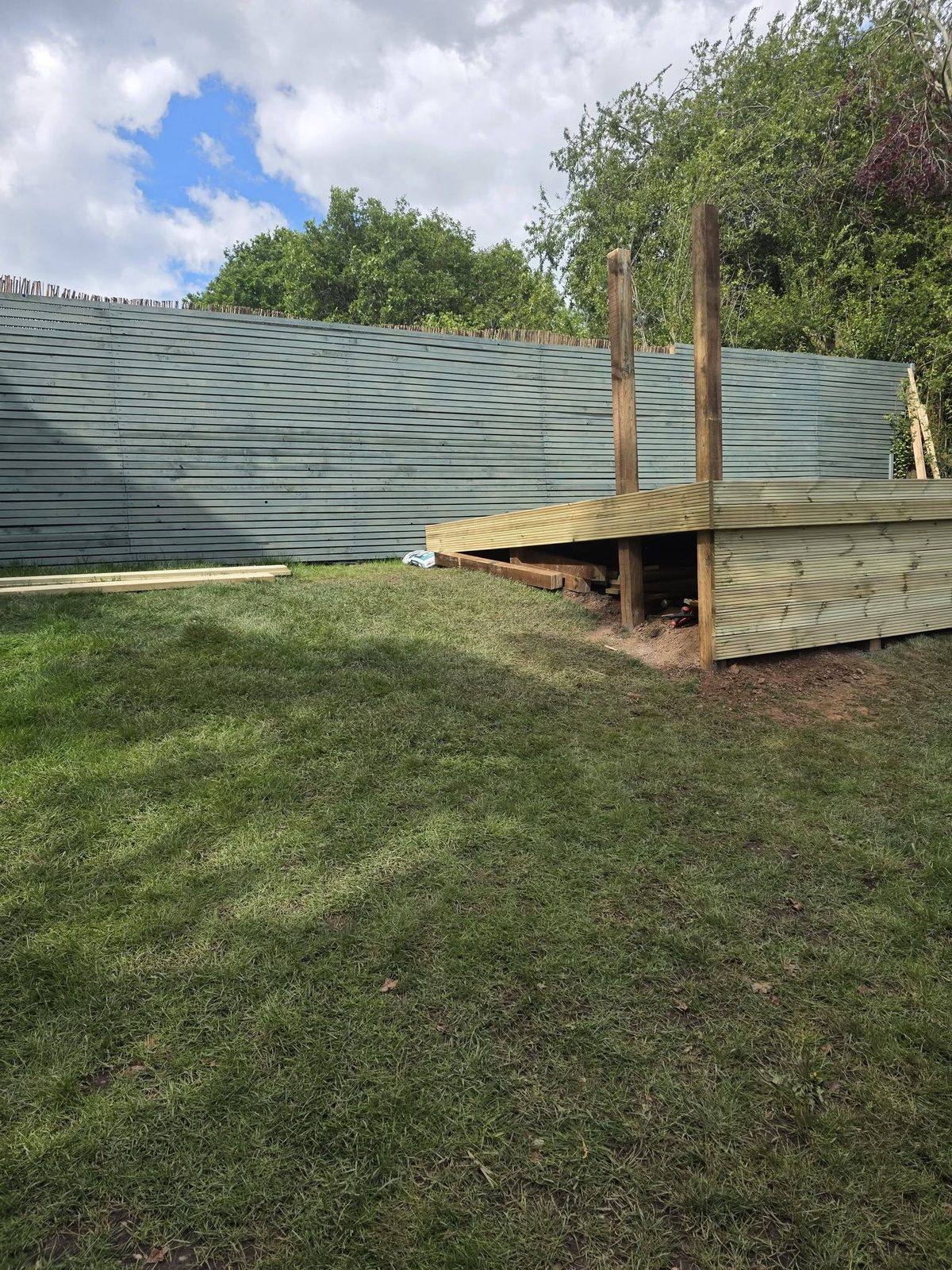 Timber fence panel installation