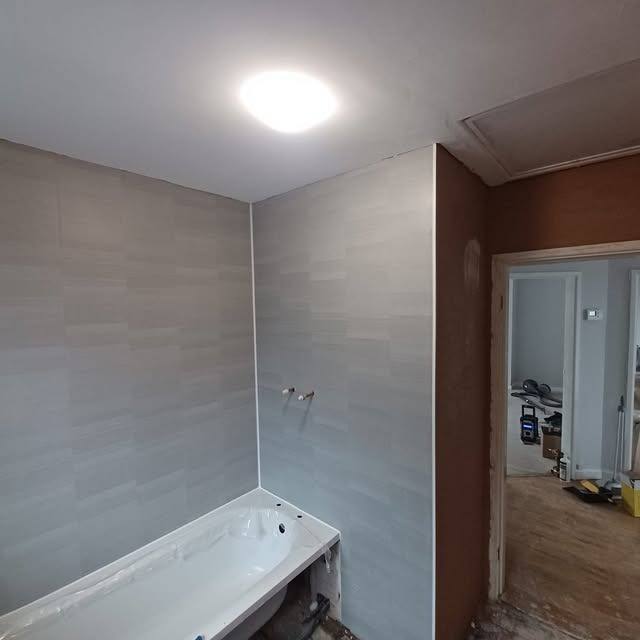Bathroom renovation with new tiling and fittings