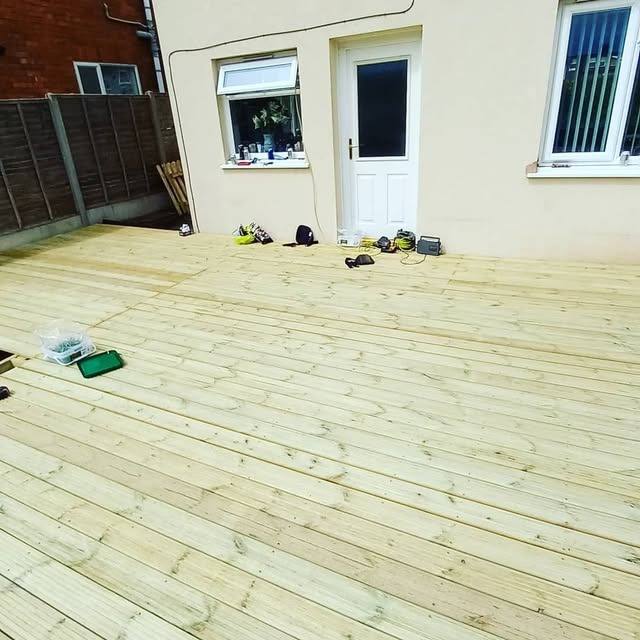 Freshly completed timber decking area next to the house