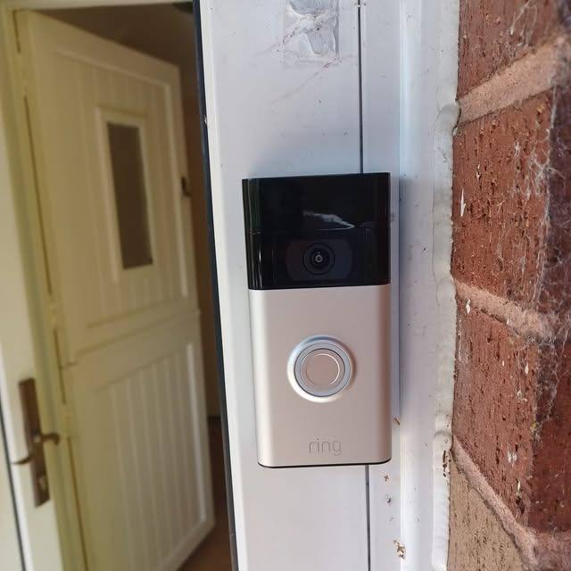 A video doorbell being fitted as part of general property maintenance
