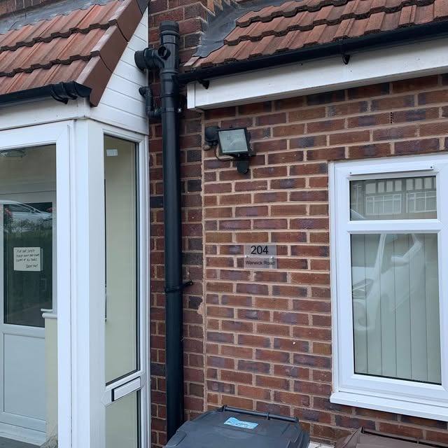 A property entrance and porch area maintained and tidied
