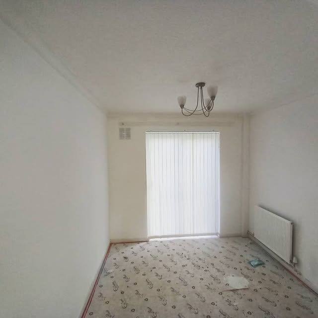 A room stripped back and prepared during renovation