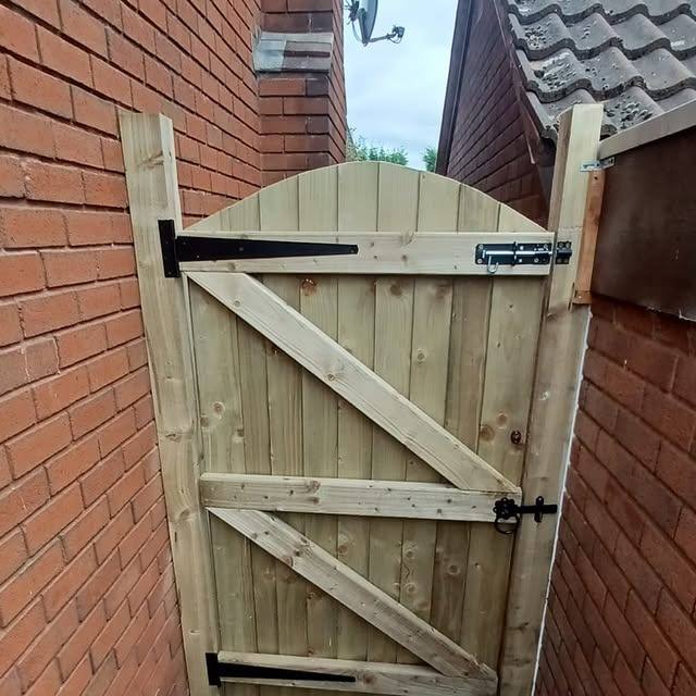 Timber ledged and braced garden gate freshly fitted